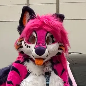 Peechy's fursuit head: pink hair, white muzzle, purple ears